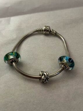Pandora Sterling Silver Bracelet With 3 Retired Pandora Charms. EUC